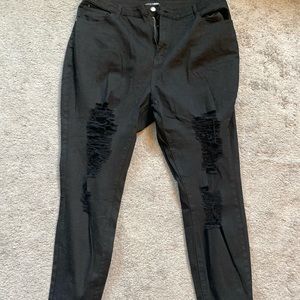 Black denim jeans ripped